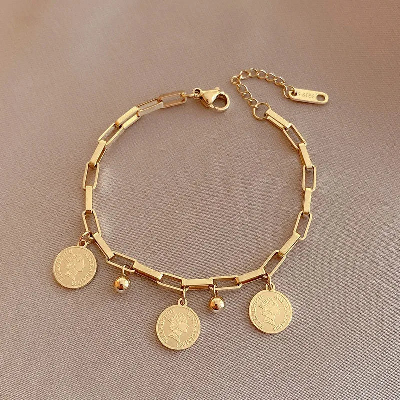 Royal Theme Gold Tone Paperclip Chain Bracelet with Coin and Bead Charms